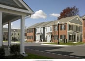 Thumbnail 3 of 6 - a rendering of a row of town houses on a street