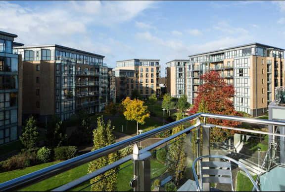 a view of apartment buildings from a balcony
