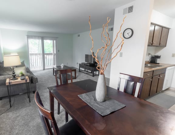 a view of the living room from the dining room table
