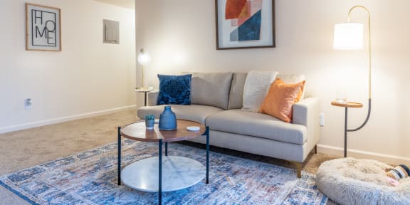 Living Room With Comfortable Sofa at Crestview at Louisville Apartments, 40217