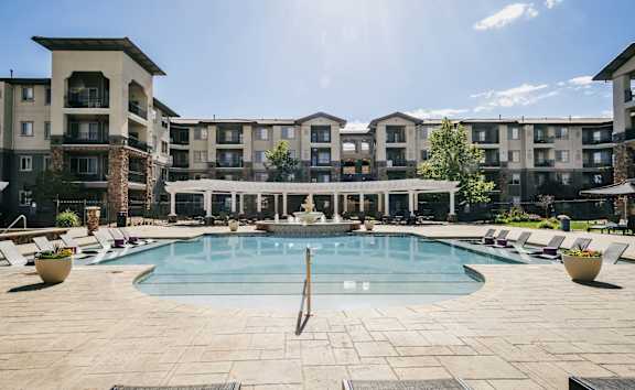 A large swimming pool in front of apartment buildings at Terracina, Broomfield, CO 80020