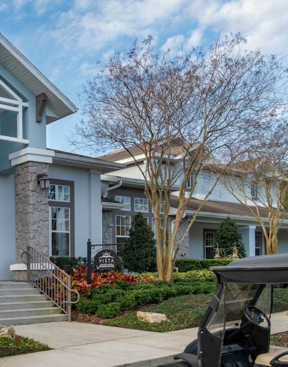 a home with a blue exterior and white trim