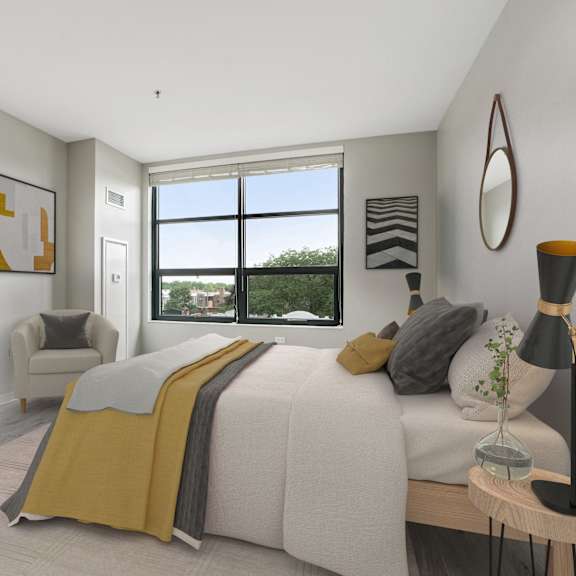 a bedroom with a large bed and a window