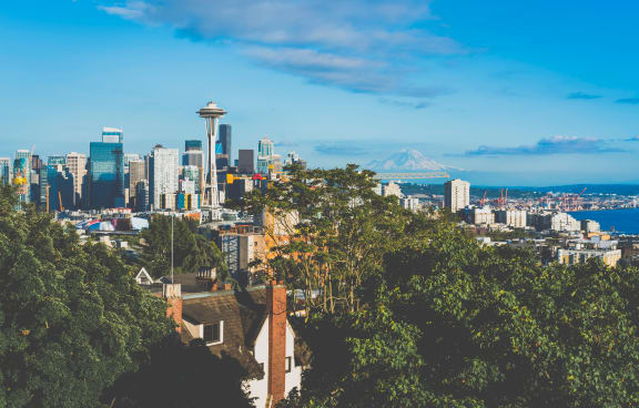 a view of the skyline with mt rainier in the background at Union Arms, Washington, 98122