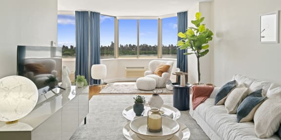 a living room filled with furniture and a large window  at Riello Apartments Owner LLC, New Jersey, 07020
