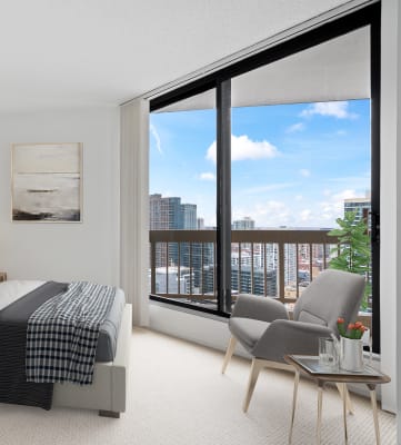 Bedroom With Expansive Windows at Asbury Plaza, Illinois, 60654
