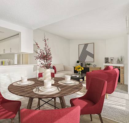 a living room and dining room with a table at Pointe East, Fife, Washington