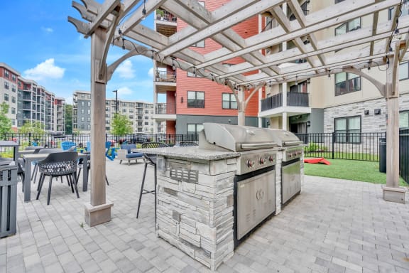 the reserve at bucklin hill patio with grill and seating area