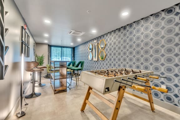 a foosball table in the resident lounge