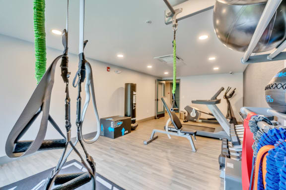 a gym with a lot of exercise equipment