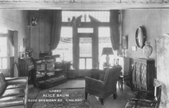 a living room filled with furniture and a large window