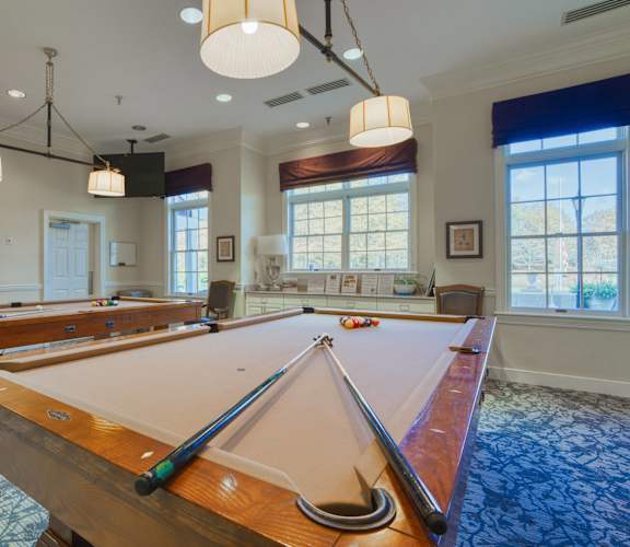 a game room with a ping pong table