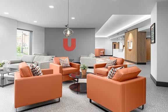a living room with couches and a table