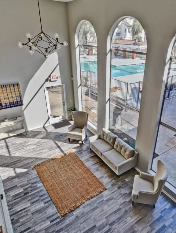 a large living room with a kitchen and a dining room