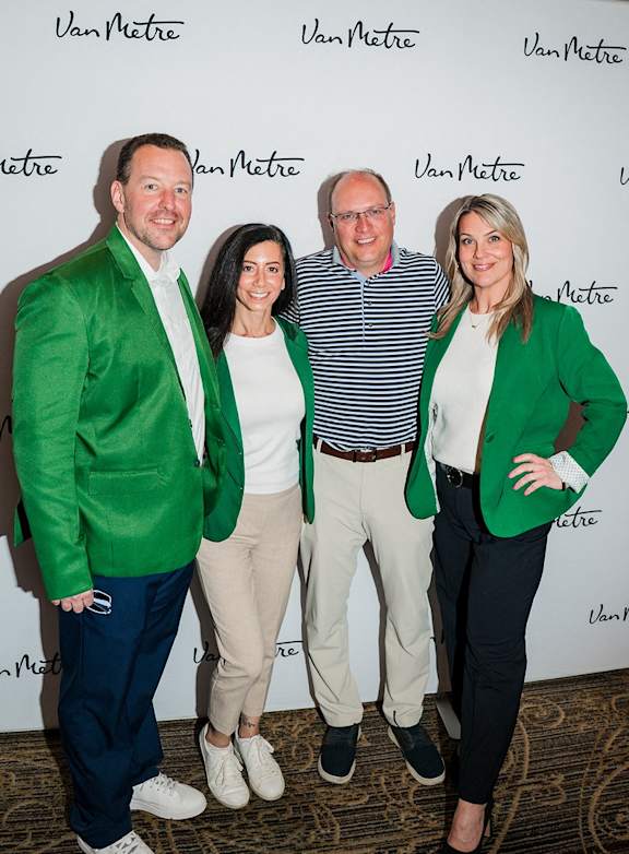 Four people are standing in front of a white background with the word  at Northlake Park Apartments, Orlando, 32827