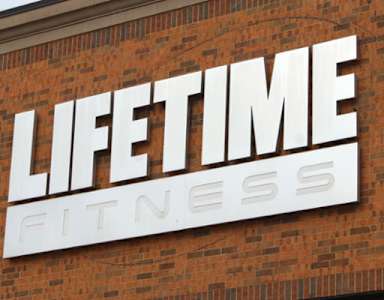 A brick building with a sign that says LIFETIME FITNESS.