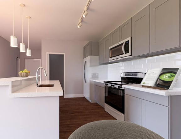 a kitchen with a counter top and a sink