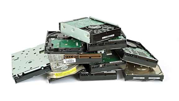 A pile of old hard drives.
