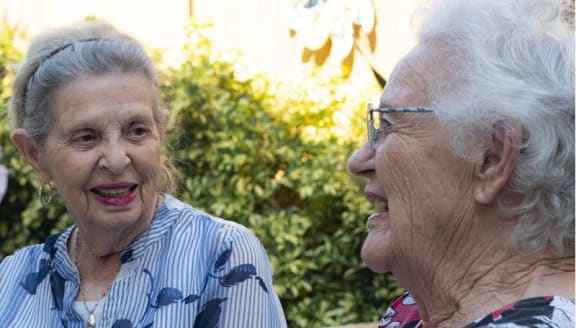 senior residents outside at Savannah Court of Brandon, Brandon, FL