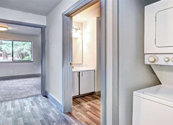 Milton Apartments - Autumn Village Apartments - Laundry and Bathroom