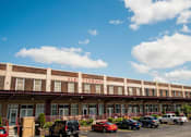 Thumbnail 1 of 5 - Ample Parking Area at The Lofts at Elk Terminal Apartments , New York
