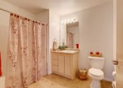 Thumbnail 16 of 19 - Decorated Bathroom at FOREST CREEK APARTMENTS, Spokane, WA 99208