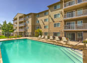 Thumbnail 6 of 19 - Swimming Pool at FOREST CREEK APARTMENTS, Spokane