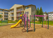 Thumbnail 9 of 19 - Playground at FOREST CREEK APARTMENTS, Spokane Washington