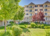 Thumbnail 2 of 18 - Open Courtyard with Seating at VINTAGE AT SPOKANE, Washington