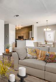 a living room with a couch and a chair