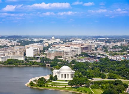 an aerial view of the city of dc with the capitol building