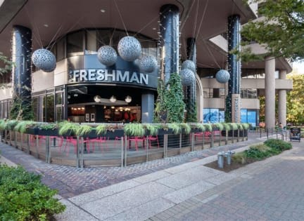 a restaurant at the front of a building