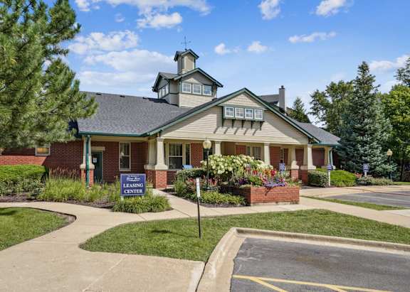 A house with a sign that says "CLEANING" in front of it.