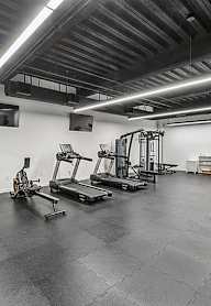 Bright Gym with equipments at 701 Hudson, Los Angeles