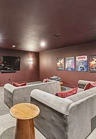 Movie room with couches at 701 Hudson, California