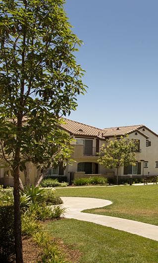 a grassy area in a courtyard at Villas at the Park