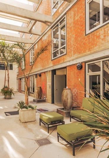 The Studios at NoHo in North Hollywood, California Exterior and Courtyard with Seating and Plants