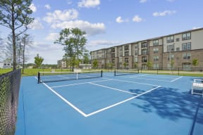 the preserve at ballantyne commons tennis courts with apartments in the background