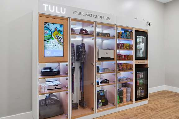 A Tulu smart rental store with various items on display.