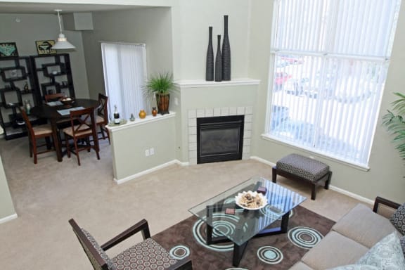 Gas Fireplace In Spacious Living Room at Townhomes for Rent in Denver with Mountain Views