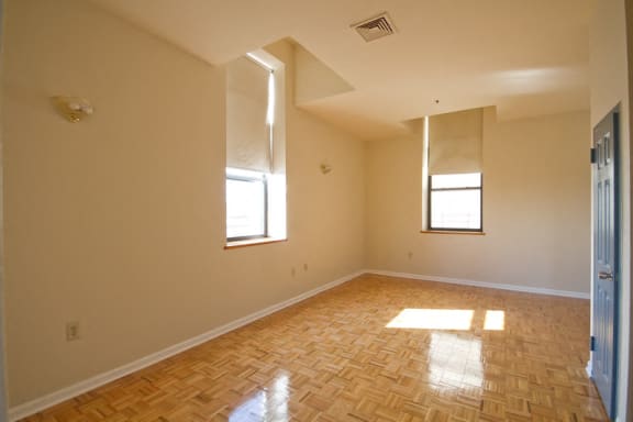 Living room with hardwood floors and beige walls