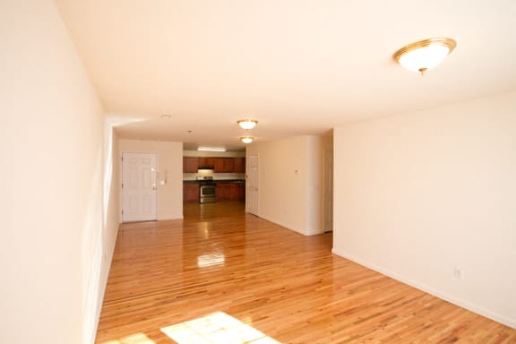 Living room with open layout and view of kitchen