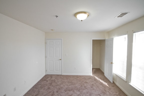 Bedroom with carpeted floors