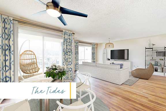 A living room with a white sofa and a television. at Marina Harbor, Marina del Rey, CA