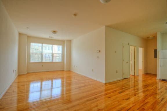 Living room area with entrances to bedrooms
