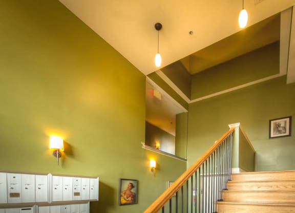 Mail room with mail boxes and staircase