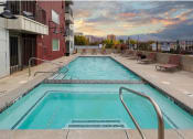 Thumbnail 2 of 4 - a swimming pool on the side of a building