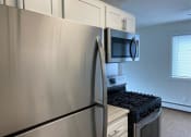 Thumbnail 4 of 18 - kitchen with stainless steal appliances