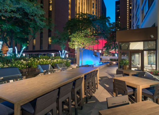 Fire Pit and Grilling Stations for Al Fresco Dining at Columbus Plaza, Chicago, IL
