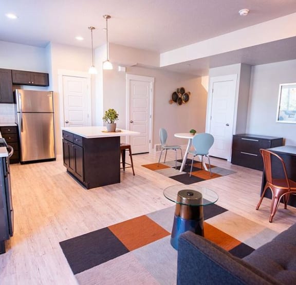 the interior of a townhome with a large airplane on the wall at Calla Homes in Milcreek, UT